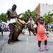 A young girl dances with the Bichini Bia Congo group during the 18th annual African American Downtown Festival. Daniel Brenner I AnnArbor.com